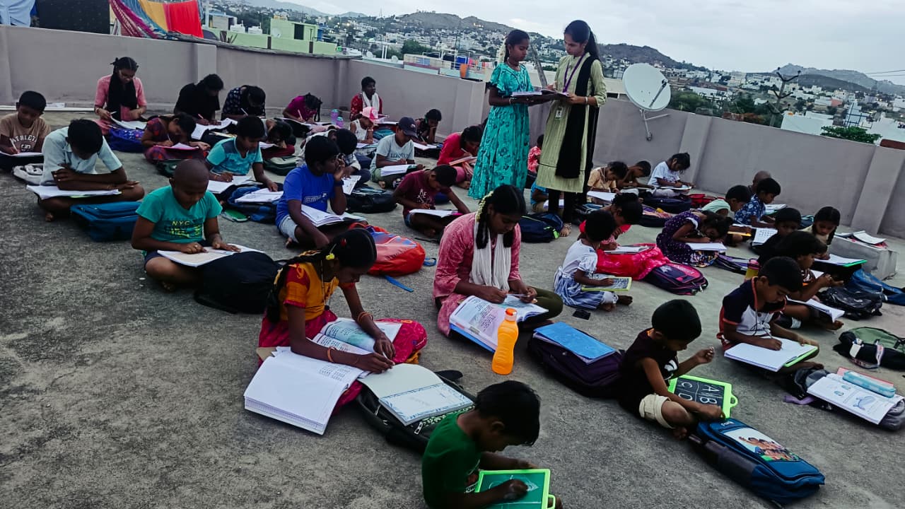 Children studying at an Akshara Dhaathree after-school study centre