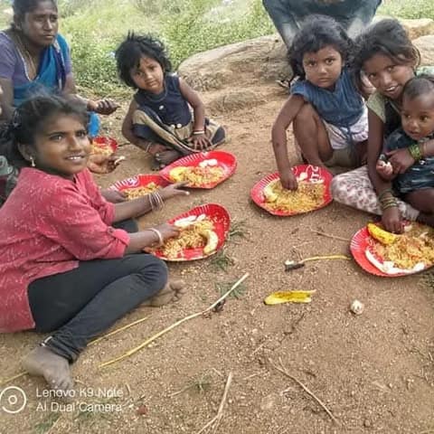 Children eating a meal served by Aahara Dhaathree